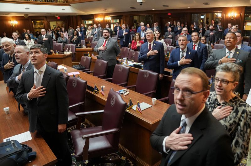 Members of the Indiana House of Representatives stand for the Pledge of Allegiance as lawmakers return for the 2026 legislative session Monday, Jan. 5, 2026, at the Indiana Statehouse in downtown Indianapolis.