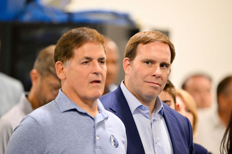 Jun 27, 2025; Dallas, TX, USA; Dallas Mavericks minority owner Mark Cuban (left) and Mavericks governor Patrick Dumont (right) looks on a press conference at the Dallas Mavericks Practice Facility.