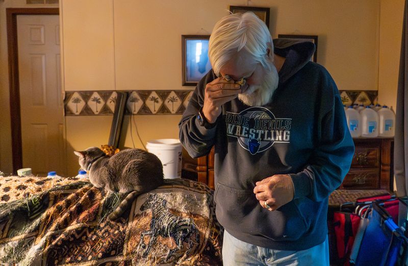 Mike Sherrill wipes tears from his eyes Wednesday, Jan. 7, 2026, inside his home in Kempton, Indiana. Sherrill talks about his daughter, Shannon, who disappeared from her mother’s backyard in 1986, at the age of 6. “I think about her everyday,” he said. “I think she's out there somewhere, and I'm hoping someday she'll come home.”