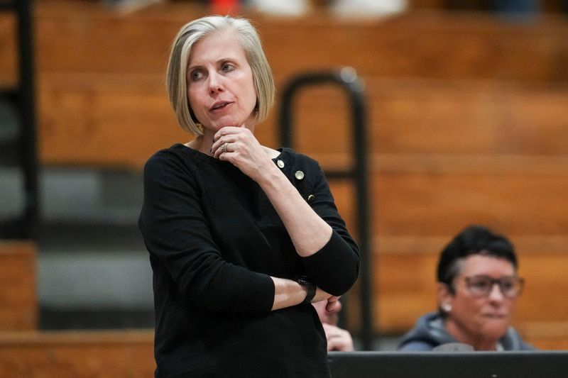 Noblesville Millers head coach Donna Buckley watches the action Wednesday, Jan. 7, 2026, during a game between the Cathedral Fighting Irish and the Noblesville Millers at Cathedral High School in Indianapolis.