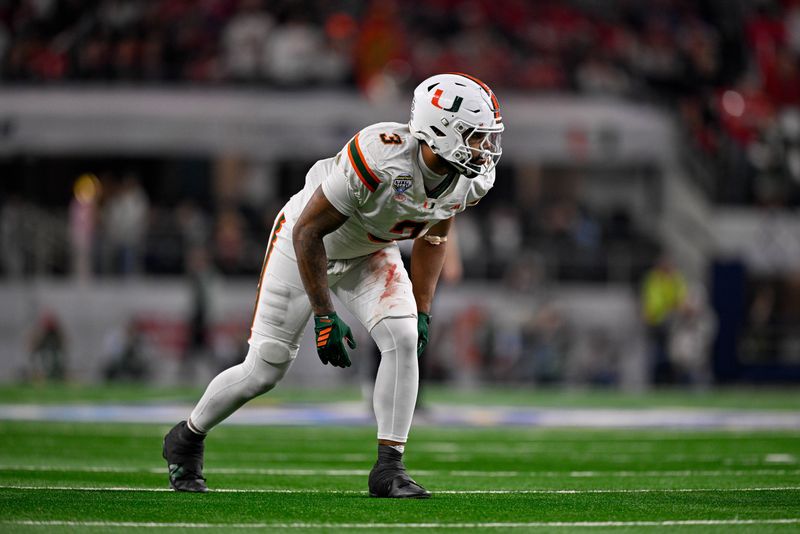 Dec 31, 2025; Arlington, TX, USA; Miami Hurricanes defensive lineman Akheem Mesidor (3) gets into position during the 2025 Cotton Bowl and quarterfinal game of the College Football Playoff at AT&T Stadium. Mandatory Credit: Jerome Miron-Imagn Images