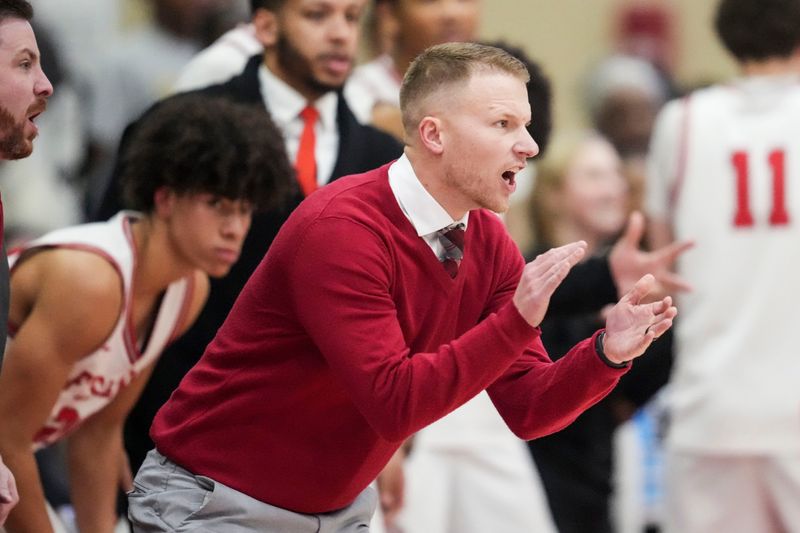 Fishers Tigers head coach Garrett Winegar yells at his team Thursday, Jan. 8, 2026, during a game between the Fishers Tigers and the Pike Red Devils at Fishers High School.