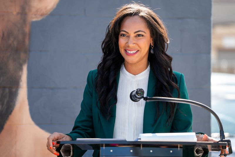 Senator Andrea Hunley speaks Tuesday, Aug. 26, 2025, during the unveiling of a new Indiana Pacers star Tyrese Haliburton mural located on the side of XG Groom Room barbershop along Ohio Street in Indianapolis. The artwork was completed by artist William Minion.