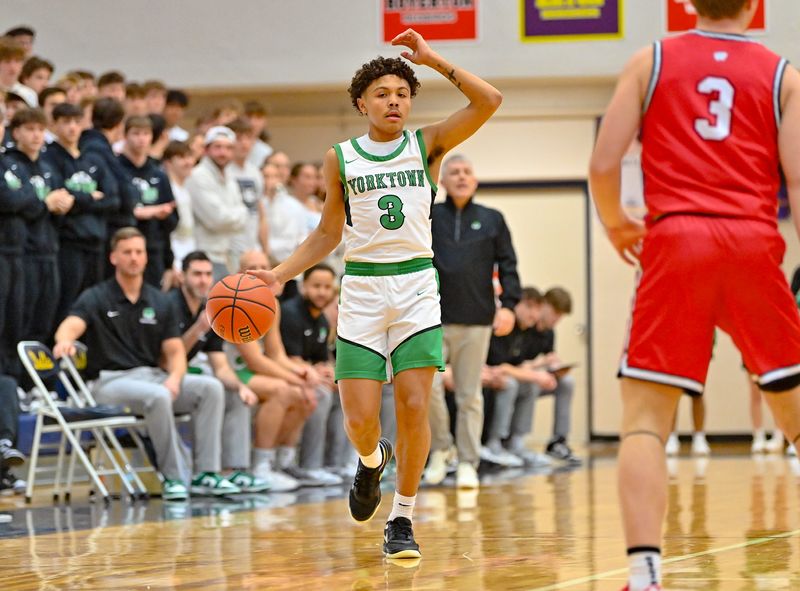 Yorktown's Zahden Zowd calls out a play during a game against Wapahani in the semifinals of the Delaware County boys basketball tournament Friday, Jan. 16, 2026, at Delta High School in Muncie.