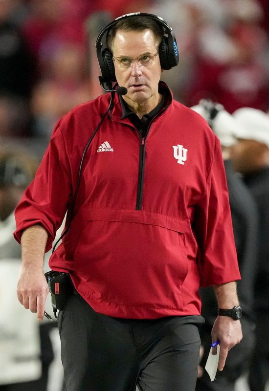 Indiana Hoosiers head coach Curt Cignetti walks the sideline Monday, Jan. 19, 2026, during the College Football Playoff National Championship college football game against the Miami (FL) Hurricanes at Hard Rock Stadium in Miami Gardens.