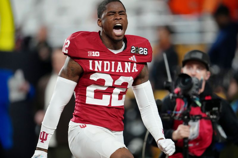 Indiana Hoosiers defensive back Jamari Sharpe (22) celebrates after making an interception against the Miami Hurricanes during the second half of the College Football Playoff National Championship game at Hard Rock Stadium.