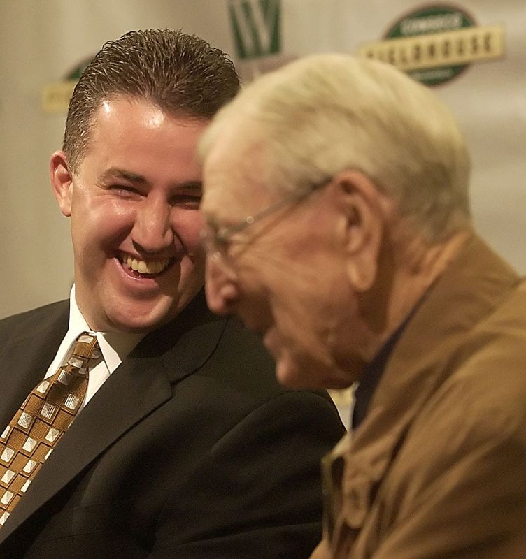 Purdue head coach Matt Painter (left) shares a laugh with legendary coach John Wooden at the annual Wooden Tradition basketball event press conference Friday at Conseco Fieldhouse. (STEVE HEALEY/Indianapolis Star)