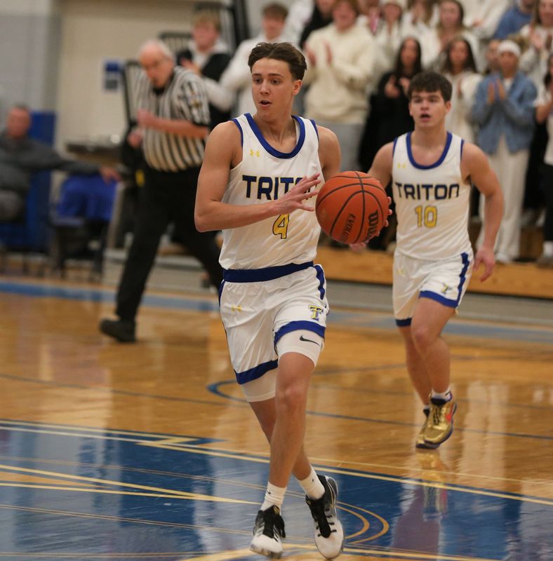 Triton senior Landon Patrick dribbles up the court during a Bi-County Tournament semifinal boys basketball game vs. Bremen January 23, 2026, at LaVille High School.