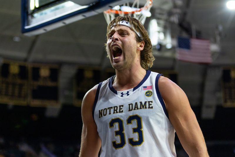 Jan 24, 2026; South Bend, Indiana, USA; Notre Dame Fighting Irish forward Carson Towt (33) celebrates against the Boston College Eagles during the second half at Purcell Pavilion at the Joyce Center. Mandatory Credit: Michael Caterina-Imagn Images