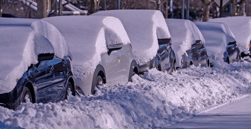Cars are buried on the Butler campus Monday, Jan. 26, 2026 in Indianapolis, Ind.