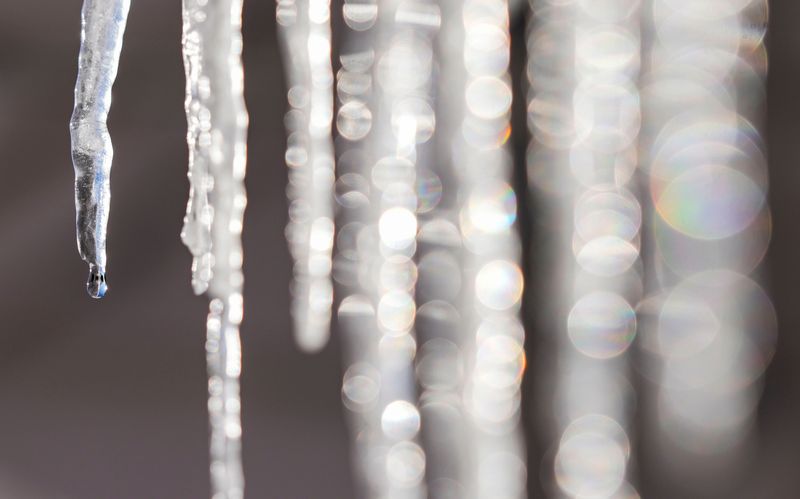 Ice sickles are seen Monday, Jan. 26, 2026, as a winter storm brought heavy snow and single digit temperatures in Broad Ripple in Indianapolis.