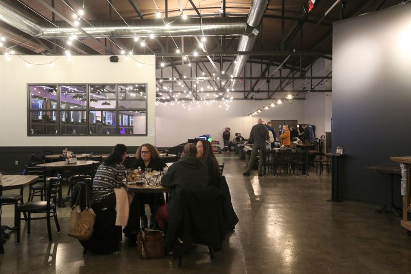 Customers eat and play duckpin bowling at Ivy Alley Social House on Jan. 23, 2026, in South Bend.