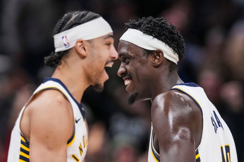 Indiana Pacers guard Andrew Nembhard (2) and Indiana Pacers forward Pascal Siakam (43) celebrate Wednesday, Jan. 28, 2026, after winning a game at Gainbridge Fieldhouse in Indianapolis. The Indiana Pacers defeated the Chicago Bulls, 113-110.