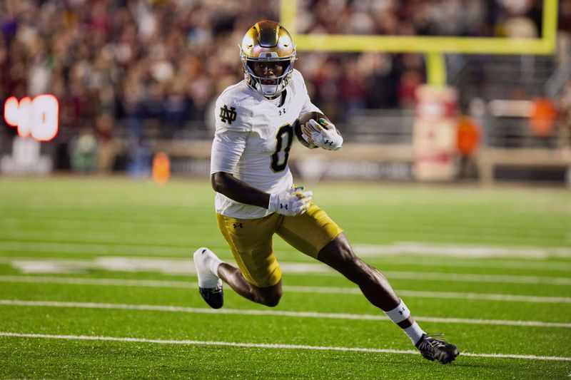 Nov 1, 2025; Chestnut Hill, Massachusetts, USA; Notre Dame Fighting Irish wide receiver Malachi Fields (0) runs after a catch in the fourth quarter against the Boston College Eagles at Alumni Stadium. Mandatory Credit: Edward Finan-Imagn Images