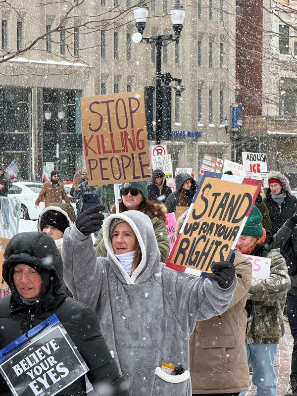 Protesters march around Monument Circle during an anti-ICE rally, Jan. 21, 2026.