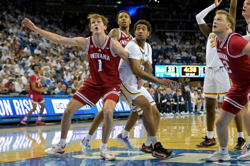 Jan 31, 2026; Los Angeles, California, USA; Indiana Hoosiers forward Reed Bailey (1) and UCLA Bruins guard Brandon Williams (5) box out for a rebound in the first half at Pauley Pavilion presented by Wescom Financial. Mandatory Credit: Jayne Kamin-Oncea-Imagn Images