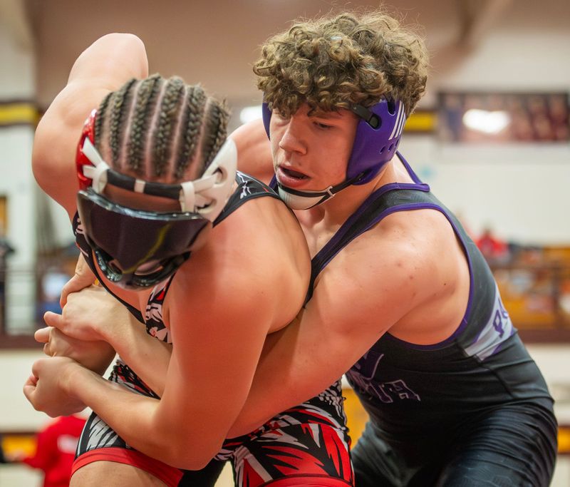 South's Denny Allgood wrestles Terre Haute North's Noah Fields in the 175 lbs. match during the IHSAA sectional wrestling meet at Bloomington High School North on Saturday, Jan. 31, 2026.
