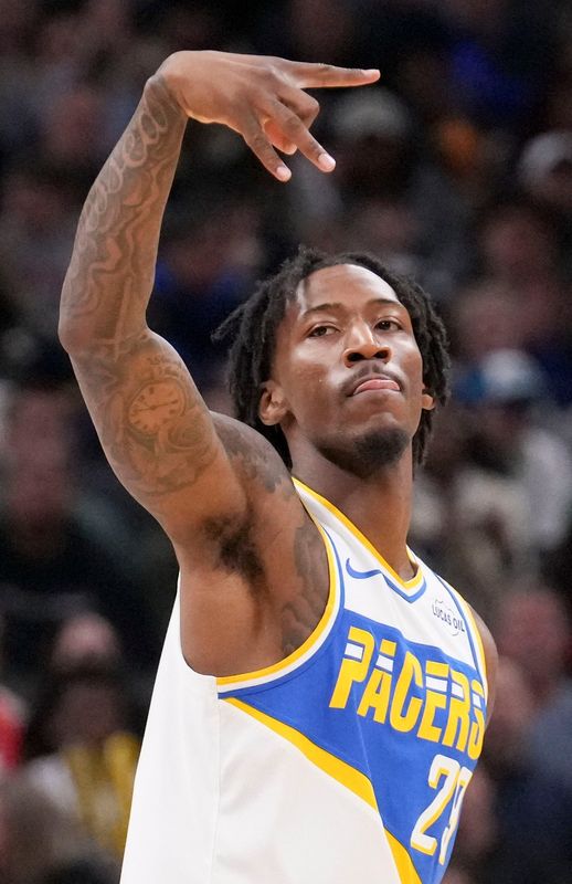 Indiana Pacers guard Quenton Jackson (29) celebrates after scoring a three-point field goal against the Utah Jazz during a game Tuesday, Feb. 3, 2026, at Gainbridge Fieldhouse in Indianapolis.