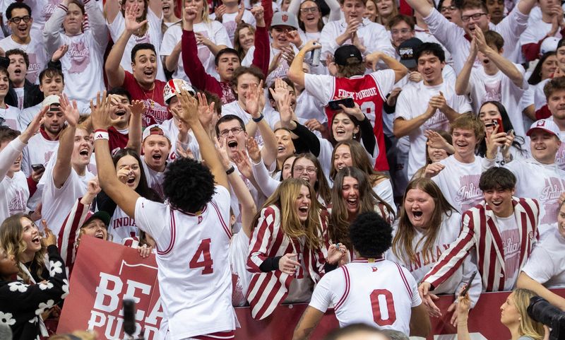 Indiana's Sam Alexis (4) and Jasai Miles (0) celebrates with fans after the Indiana versus Purdue mens basketball game at Simon Skjodt Assembly Hall on Tuesday, Jan. 27, 2026.