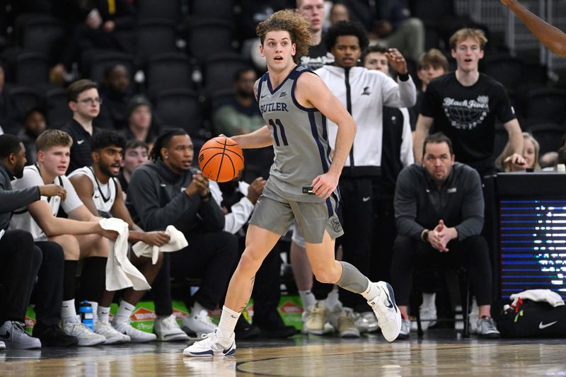 Feb 4, 2026; Providence, Rhode Island, USA; Butler Bulldogs guard Finley Bizjack (11) dribbles the ball during the first half against the Providence Friars at Amica Mutual Pavilion. Mandatory Credit: Eric Canha-Imagn Images