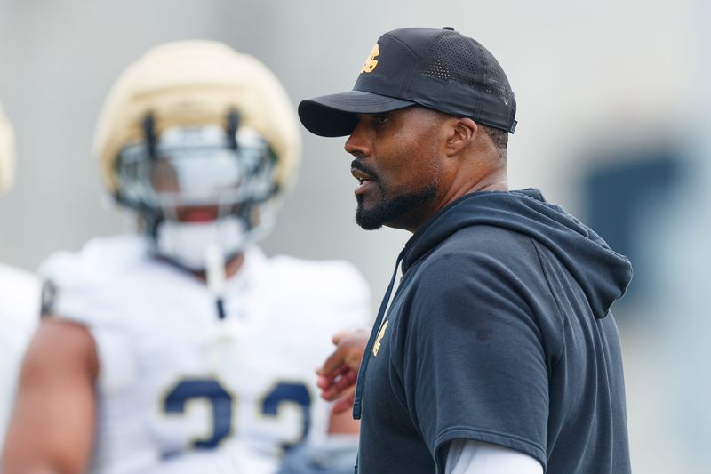 Notre Dame defensive line coach Al Washington runs drills during a football practice at Irish Athletic Center on Thursday, July 31, 2025, in South Bend.