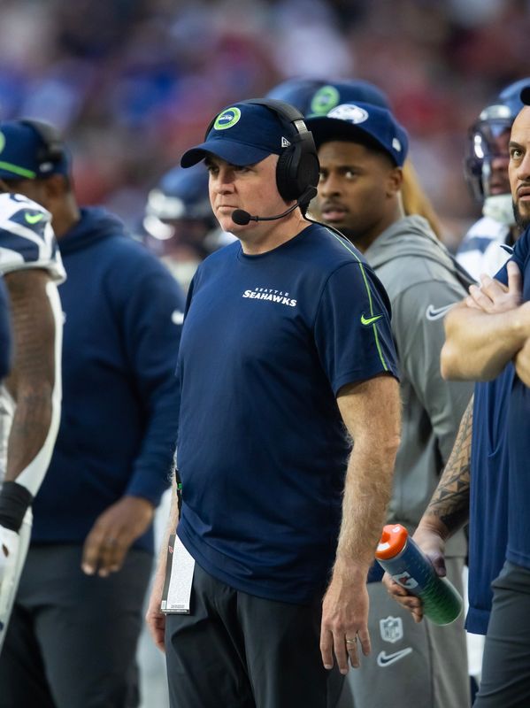 Dec 8, 2024; Glendale, Arizona, USA; Seattle Seahawks inside linebackers coach Kirk Olivadotti against the Arizona Cardinals at State Farm Stadium. Mandatory Credit: Mark J. Rebilas-Imagn Images