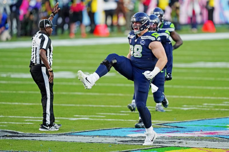 Feb 8, 2026; Santa Clara, CA, USA; Seattle Seahawks defensive tackle Rylie Mills (98) reacts after a play during the second quarter against the New England Patriots in Super Bowl LX at Levi's Stadium. Mandatory Credit: Darren Yamashita-Imagn Images