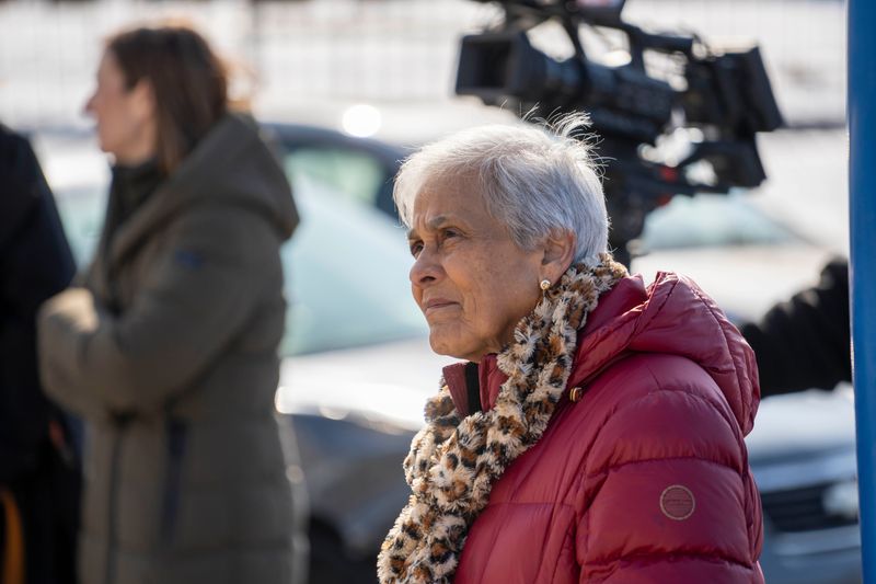 Stella Chase Reese Chase is the daughter of Chef Leah Chase, who originally inspired Disney's Princess Tiana, watches as the crew installs beads and a pot on gumbo on the dinosaurs at the Children’s Museum, Monday, Feb. 9, 2026, in Indianapolis.