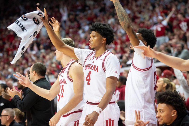 Indiana's Sam Alexis (4) and the Hoosiers celebrate a Wilkerson three-pointer during the Indiana versus Oregon men's basketball game at Simon Skjodt Assembly Hall on Monday, Feb. 9, 2026.