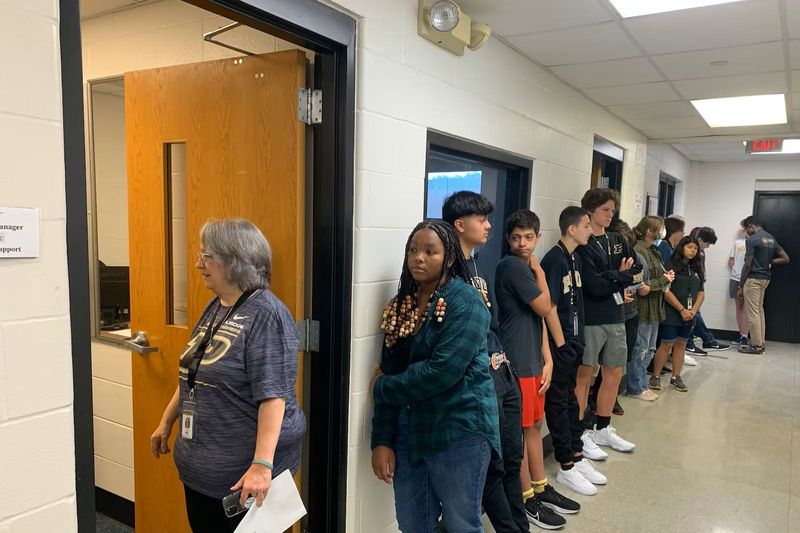 Purdue Polytechnic High School students line the walls of the building now known as Broad Ripple Middle School on the first day of school in a new building in 2022.