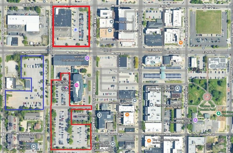 The map shows city-owned property, in red, to the north and south of the existing convention center, and county-owned property, in blue, to the west. Local officials are targeting the sites for potential development of a convention center host hotel.