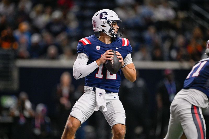 Jan 27, 2026; Frisco, TX, USA; West quarterback Joe Fagnano (12) drops back to pass the ball against the East during the second half at the Ford Center at the Star. Mandatory Credit: Jerome Miron-Imagn Images