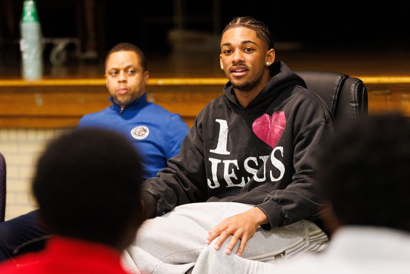 Notre Dame cornerback Leonard Moore, right, gives a talk to a group of Edison K-8 School students with Gentlemen & Scholars for the Tackle Attendance program on Friday, Feb. 13, 2026, in South Bend.