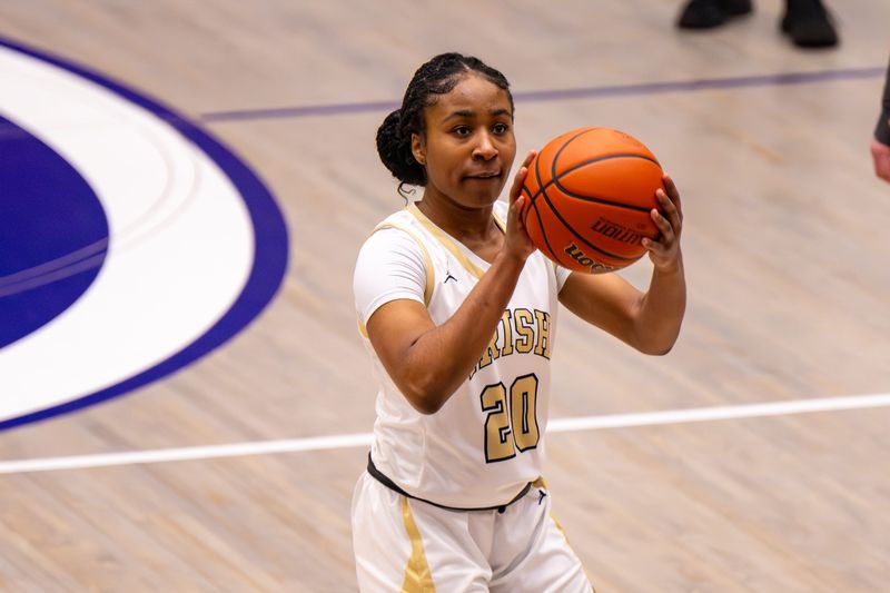 Cathedral High School senior Precious Anuka (20) shoots a free throw during the second half of an IHSAA regional basketball championship game against Roncalli High School, Saturday, Feb. 14, 2026, at Greencastle High School. Roncalli High School won 52-50.