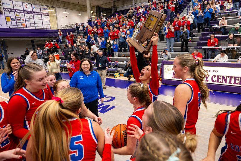 Roncalli High School players celebrate after winning an IHSAA regional basketball championship game against Cathedral High School, Saturday, Feb. 14, 2026, at Greencastle High School. Roncalli High School won 52-50.