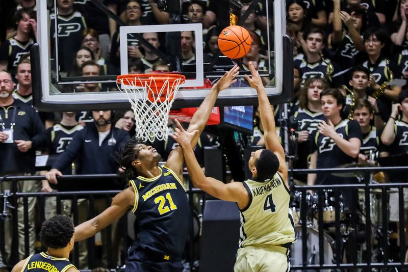 Trey Kaufman-Renn shoots over Michigan's Morez Johnson Jr. during the first half of Purdue's game against Michigan on Feb. 17, 2026 at Mackey Arena in West Lafayette, IN.
