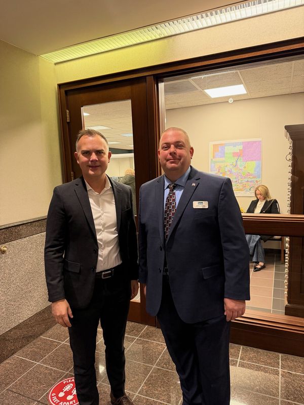 Hamilton County Sheriff Dennis Quakenbush, left, poses for a photo with John Lowes after Lowes officially filed to run for sheriff in February 2026.