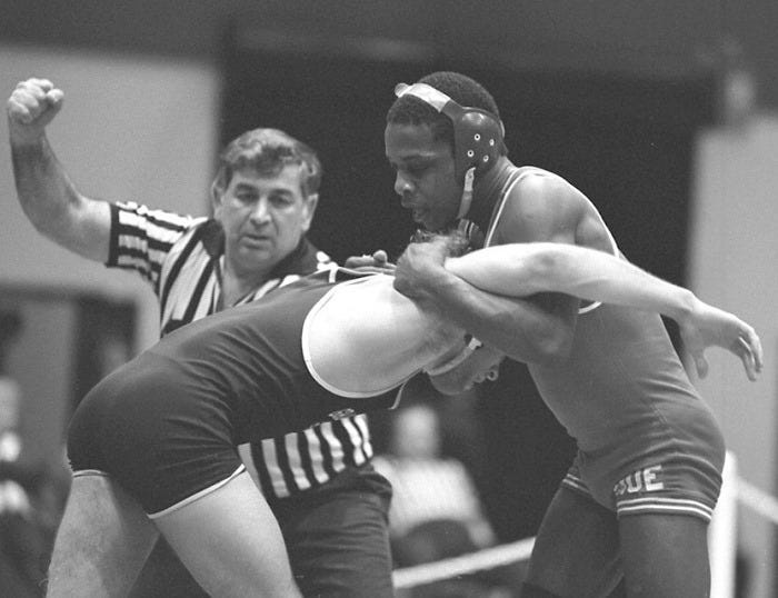 Tim Wright of Southern Illinois University (right) was the first four-time champion in NCAA wrestling and the first athlete in any sport at any level to win four straight championships.