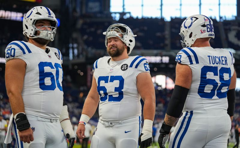 Indianapolis Colts center Danny Pinter (63) stands with Indianapolis Colts center Tanor Bortolini (60) and Indianapolis Colts guard Dalton Tucker (68) on Sunday, Sept. 14, 2025, ahead of the game against the Denver Broncos at Lucas Oil Stadium in Indianapolis.