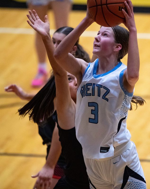 Reitz's Kierstyn Kaiser (3) takes a shot as the Center Grove Lady Trojans play the Reitz Lady Panthers during the 2026 IHSAA Class 4A Girls Basketball semistate game two at Jasper High School in Jasper, Ind., Saturday, Feb. 21, 2026.