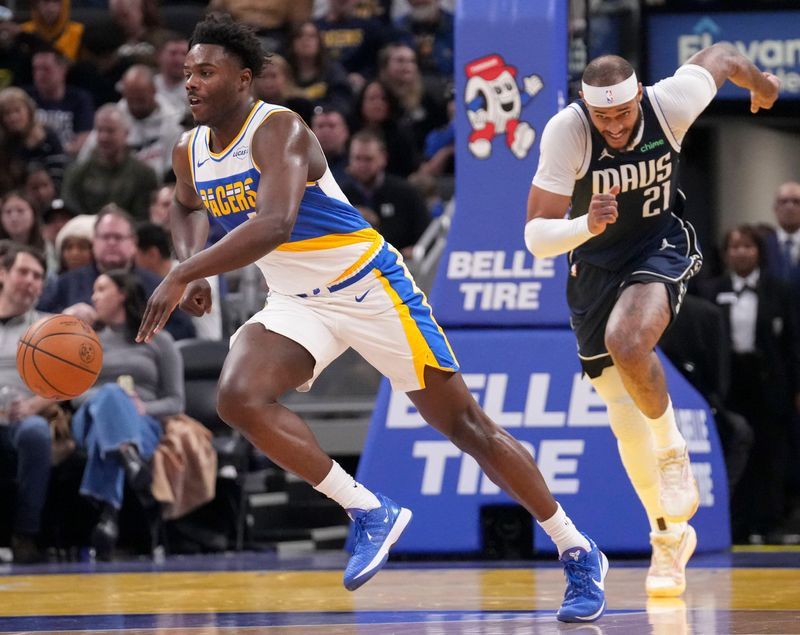Dallas Mavericks forward Daniel Gafford (21) chases after Indiana Pacers guard Kobe Brown (24) during a game Sunday, Feb. 22, 2026, at Gainbridge Fieldhouse in Indianapolis. The Mavericks defeated the Pacers 134-130.