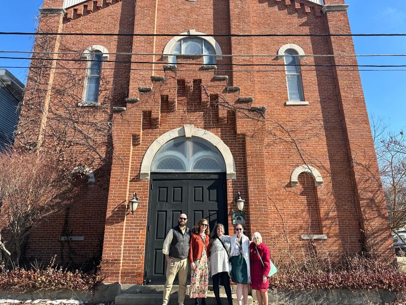 Members of Ahavas Achim Cultural Center, Inc., a non profit formed to purchase a historic synagogue located at 17 South 7th St. in Lafayette, stand in front of the building, which is currently for sale.