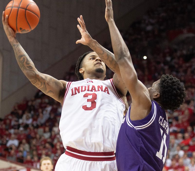 Indiana's Lamar Wilkerson (3) shoots over Northwestern's Jordan Clayton (11) during the Indiana versus Northwestern men's basketball game at Simon Skjodt Assembly Hall on Tuesday, Feb. 24, 2026.