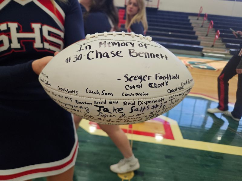 Seeger football and cheer presented friends and family with a ball to memorialize Riverton Parke wrestler, football and baseball player Chase Bennett on Wednesday, Feb. 26, 2026.