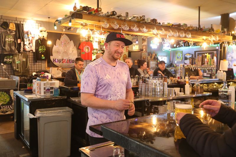 Hop Station co-owner Casey Stuber talks to a customer at Hop Station on Feb. 26, 2026, in Mishawaka.