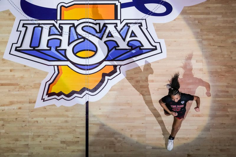 Center Grove guard Gracyn Gilliard (22) is introduced Saturday, Feb. 28, 2026, during the Class 4A IHSAA girls state basketball championship game at Gainbridge Fieldhouse in Indianapolis.