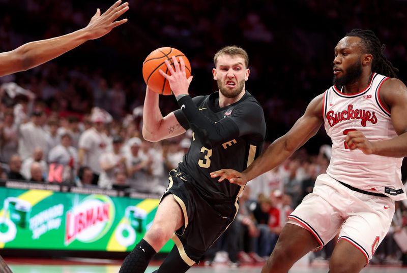 Mar 1, 2026; Columbus, Ohio, USA; Purdue Boilermakers guard Braden Smith (3) drives to the basket as Ohio State Buckeyes guard Bruce Thornton (2) defends during the first half at Value City Arena. Mandatory Credit: Joseph Maiorana-Imagn Images