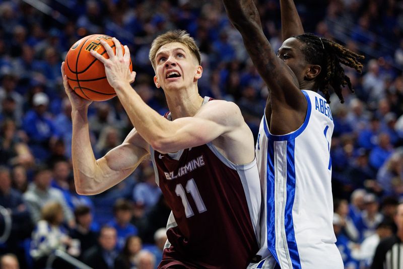 Dec 23, 2025; Lexington, Kentucky, USA; Bellarmine Knights forward Brian Waddell (11) takes the ball to the basket against Kentucky Wildcats guard Denzel Aberdeen (1) during the first half at Rupp Arena at Central Bank Center.