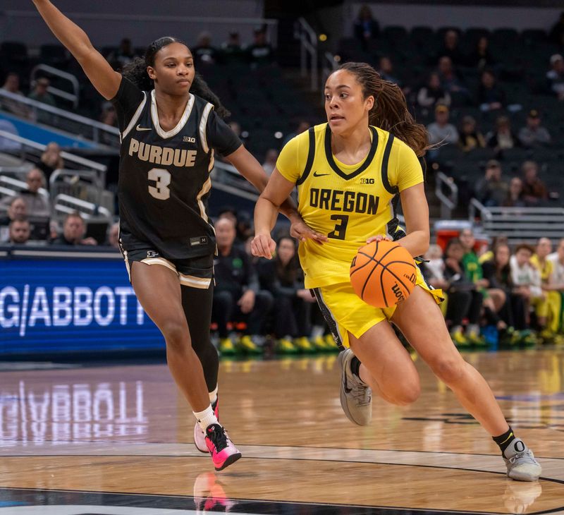 Oregon Ducks guard Sofia Bell (3) moves to the ball on Purdue Boilermakers guard Nya Smith (3) in the first half as Oregon Ducks face the Purdue Boilermakers at the Big Ten Conference women's basketball tournament Wednesday, March 4, 2026, at the Gainbridge Fieldhouse, in Indianapolis.
