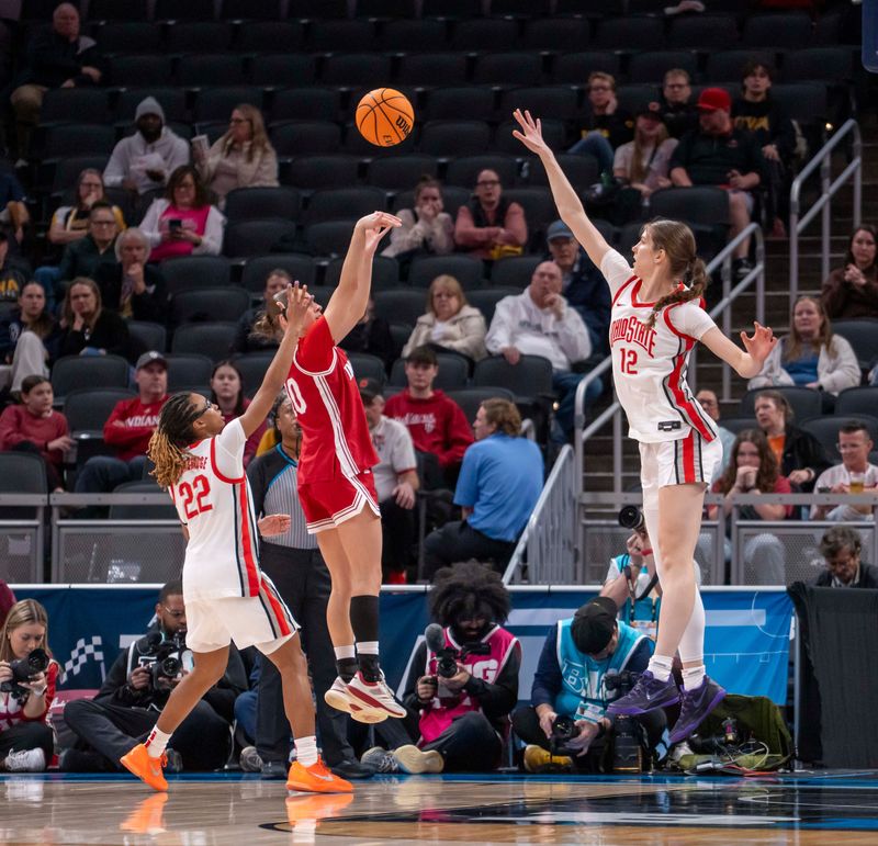 Indiana Hoosiers guard Shay Ciezki (10) shoots as Ohio State Buckeyes center Elsa Lemmilä (12) attempts to block the shot as the Indiana Hoosiers face the Ohio State Buckeyes in the second round of the Big Ten women's basketball tournament Thursday, March 5, 2026, at the Gainbridge Fieldhouse, in Indianapolis.